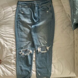 American Eagle jeans. Holes in knees. Distressing.
